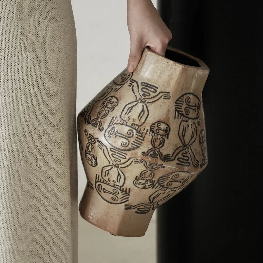 Ceramic cylindrical vase with hand-painted vintage carved tribal totem artwork