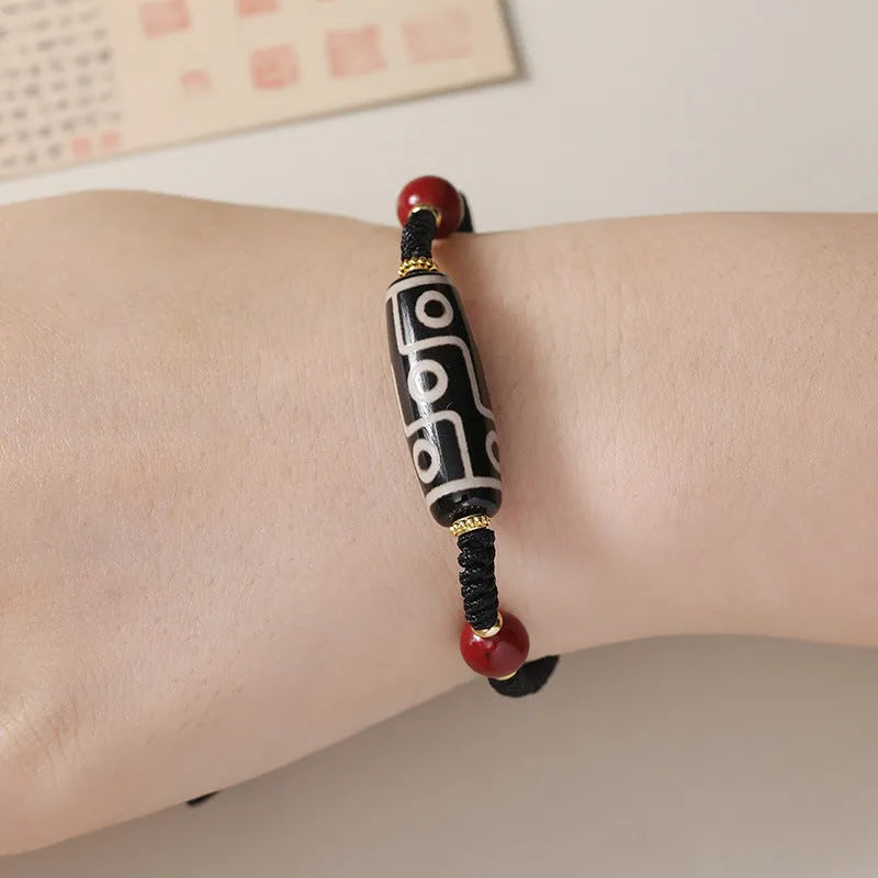 Adjustable Tibetan agate dzi bead bracelet showing traditional bead patterns