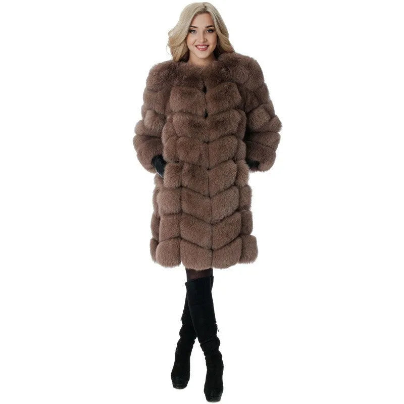 Women's long artificial fur coat in a choice of colours including apricot and black, showing regular sleeves.