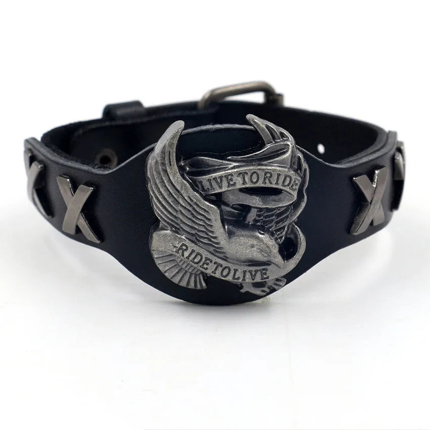 Black geometric leather bracelet with an alloy eagle watch-button clasp, shown flat displaying its 26cm length.