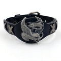 Black geometric leather bracelet with an alloy eagle watch-button clasp, shown flat displaying its 26cm length.