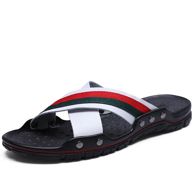 Men's blue cowhide leather flip-flops with a non-slip PU sole on a sandy beach.
