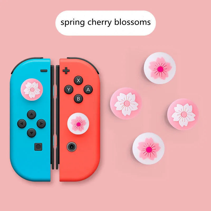 Nintendo Switch silicone joycon sleeve with four cat claw rocker caps in assorted colours