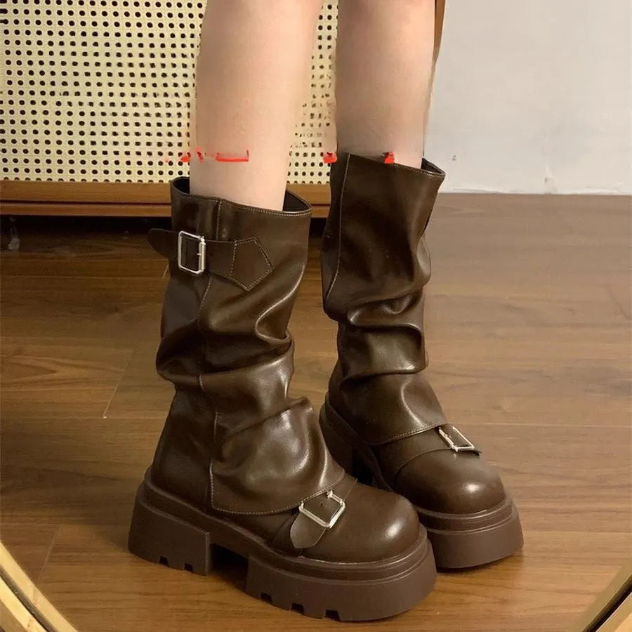 Brown retro platform height increasing boots with wedge heel, side zip, and round toe