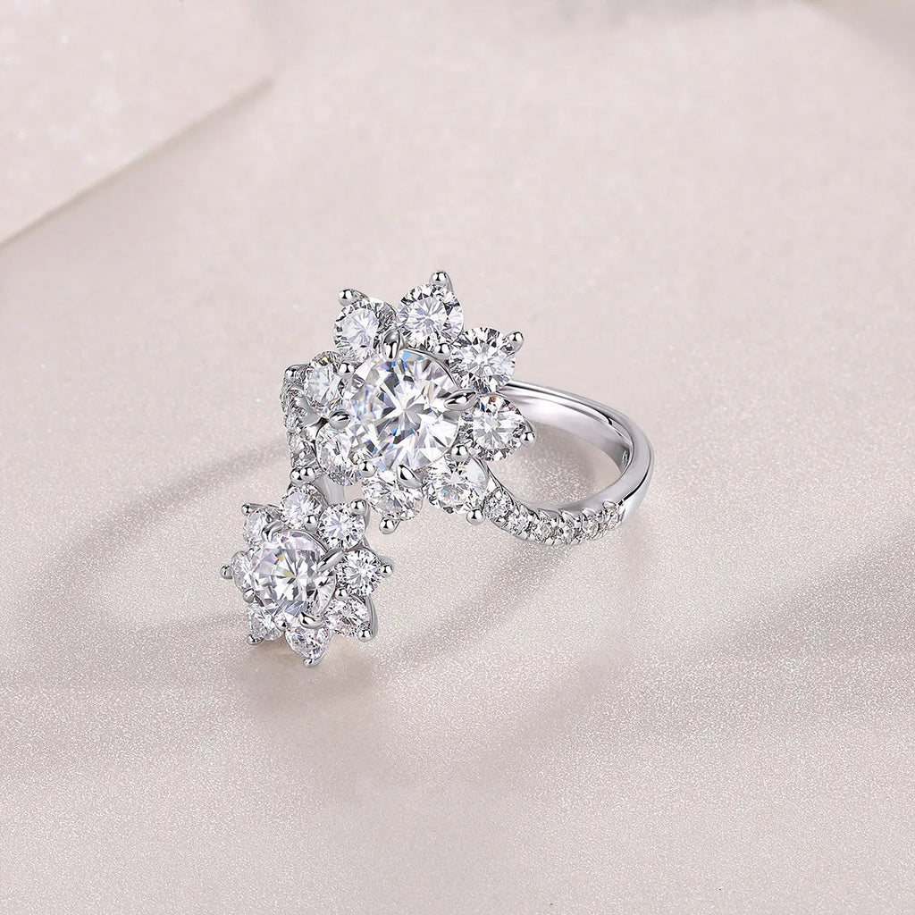 Wedding ring set with 1 carat round moissanite stone in S925 silver with platinum plating on white background