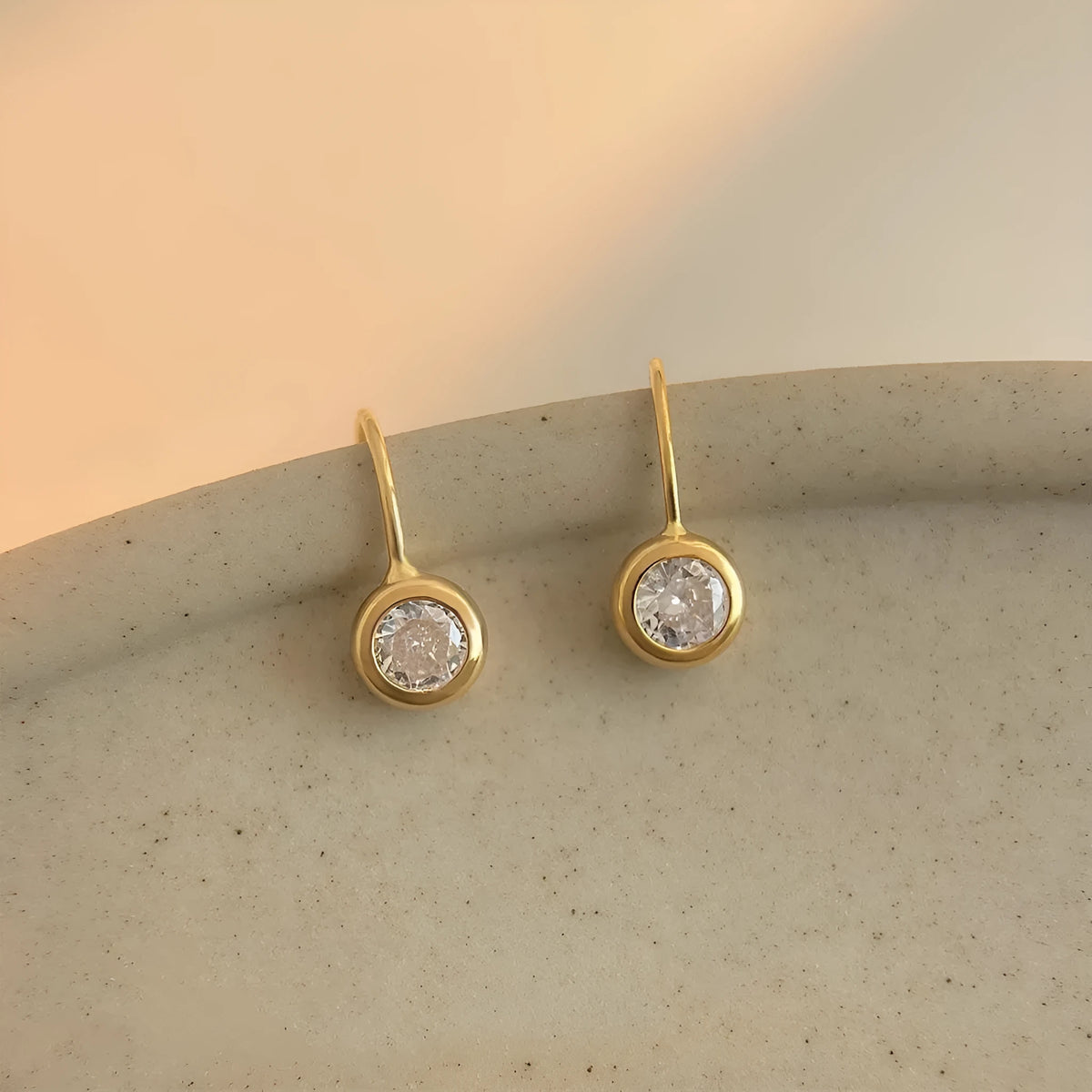 Round zircon earrings for women in minimalist geometric style, light luxury finish, simple zircon colour, one pair