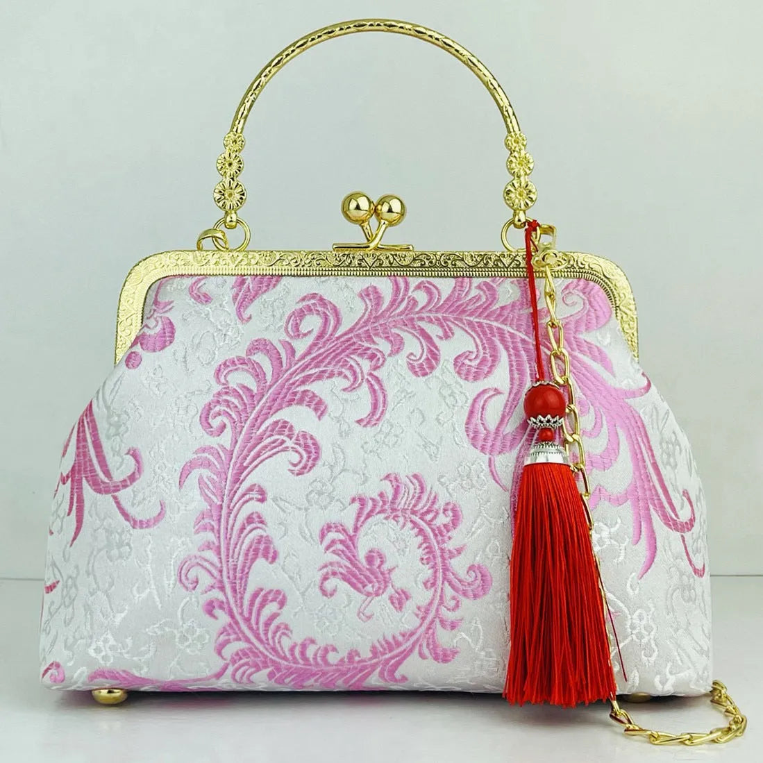 Chinese embroidery cheongsam handbag in polyester with shell shape and internal zipper compartment