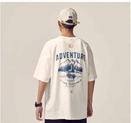 Men's black loose fit short-sleeved t-shirt on a hanger