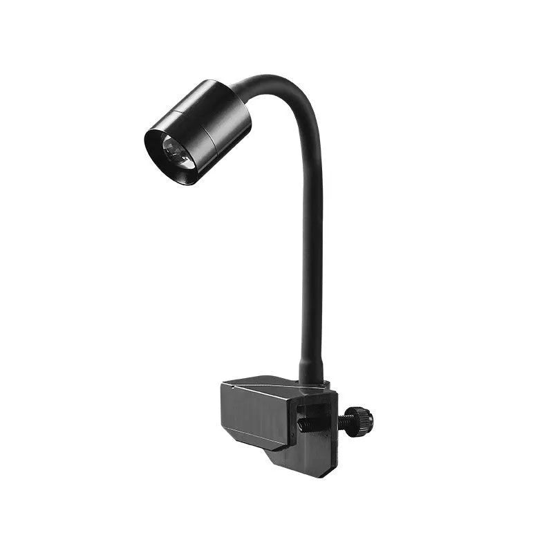 Mini LED aquarium light with adjustable clip mounting on small fish tank