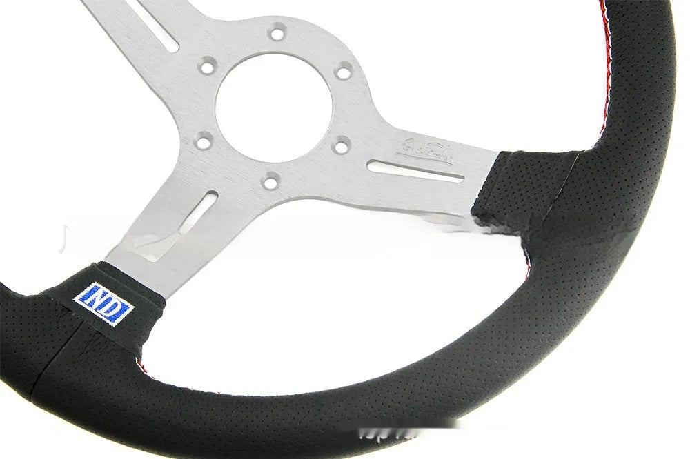 14-inch leather steering wheel with a concave centre section, shown with a silver skeleton frame