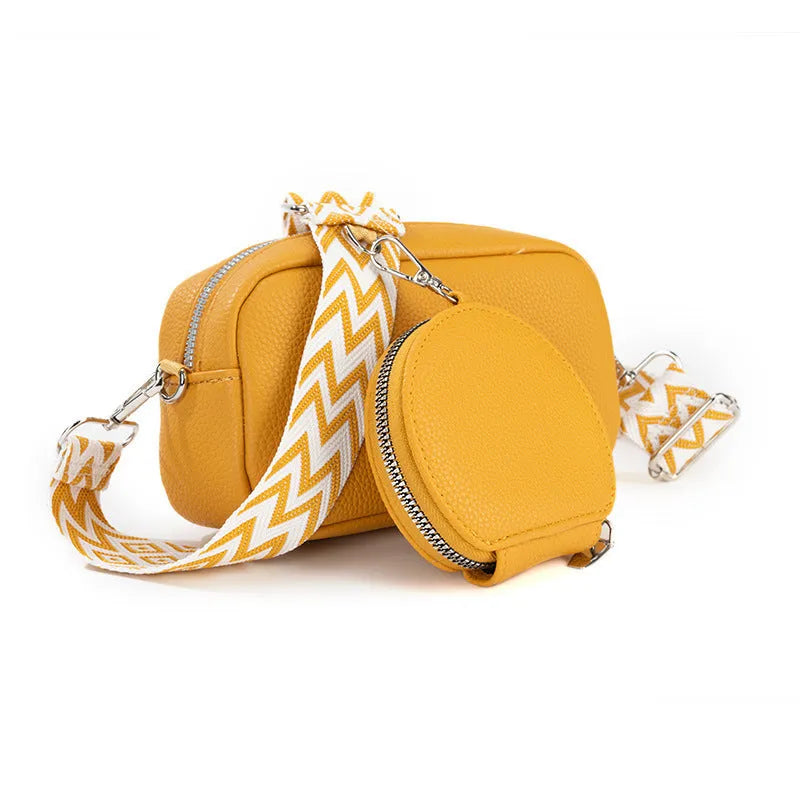 Soft black PU crossbody bag for women with a single shoulder strap and decorative sewing thread details.