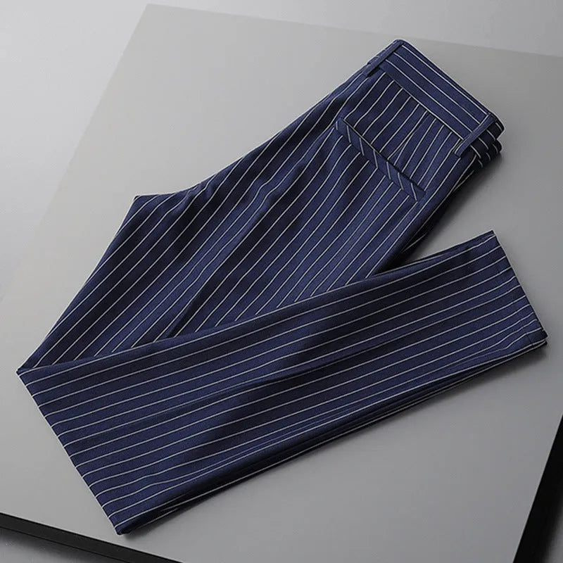 Men's thin striped loose suit pants in black and white, showing trousers style and crop jeans options