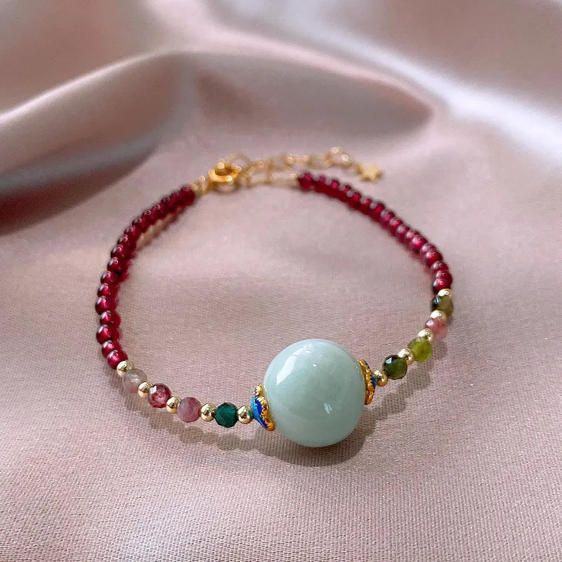 Aquamarine colour tourmaline bracelet with drop shape gemstones and Korean-style design