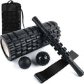 Black foam massage roller stick with six segmented gear design, 33cm length
