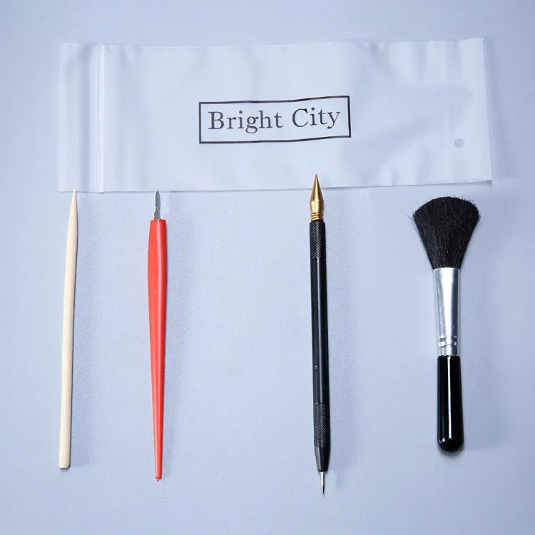Scratch painting tools kit showing healing pen models, scrapers, brushes, and photo frames for creative art projects