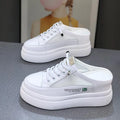 White women's mesh platform shoes with round toe and rubber sole.