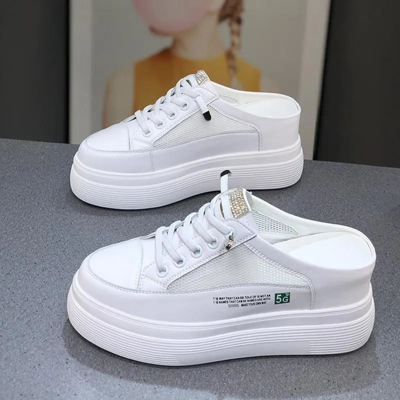 White women's mesh platform shoes with round toe and rubber sole.
