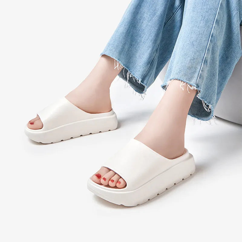 Women's fish mouth slippers with a thick light-coloured sole, shown in a beige colour option.