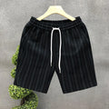 Men's black and white striped fleece-lined casual shorts with elastic waistband