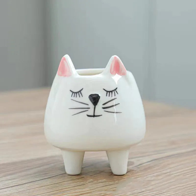 Ceramic succulent flowerpot with hand painted cartoon animal design in colourful pattern