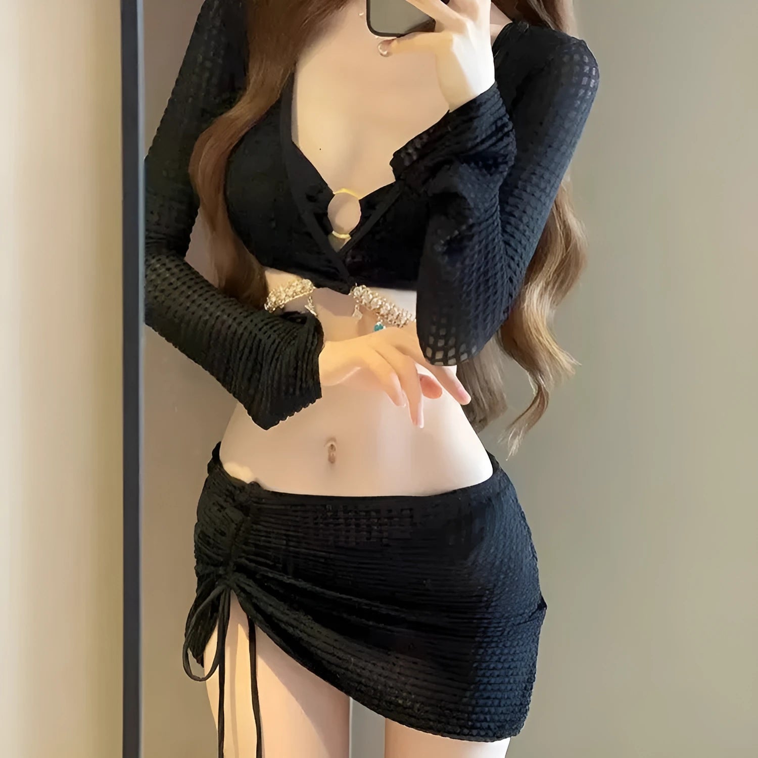 Women's long sleeve black and white bikini swimsuit for swimming.