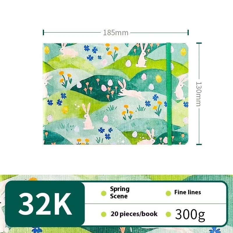 Feiluniao handmade fabric watercolour notebook with illustrated cover, open to show blank paper pages.