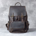 Brown genuine cowhide leather backpack with double shoulder straps and soft handle