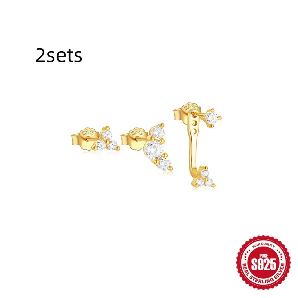 Set of three S925 sterling silver geometric stud earrings with zircon accents in gold tone.