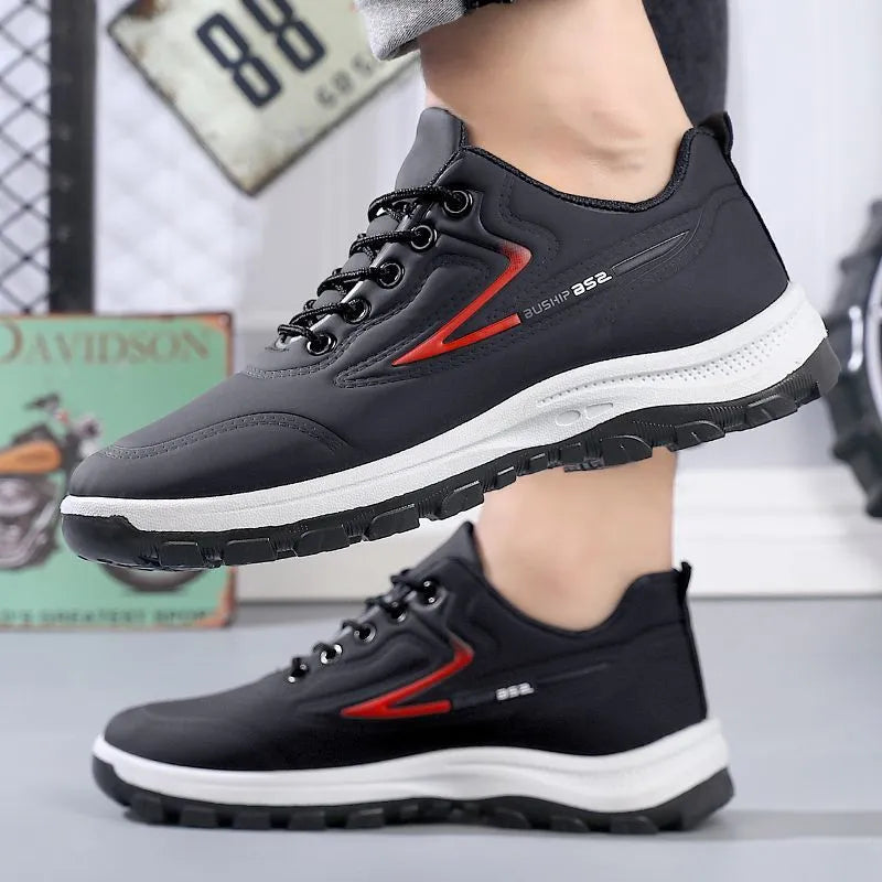 Waterproof leisure shoes with artificial PU upper in black and grey colour combination