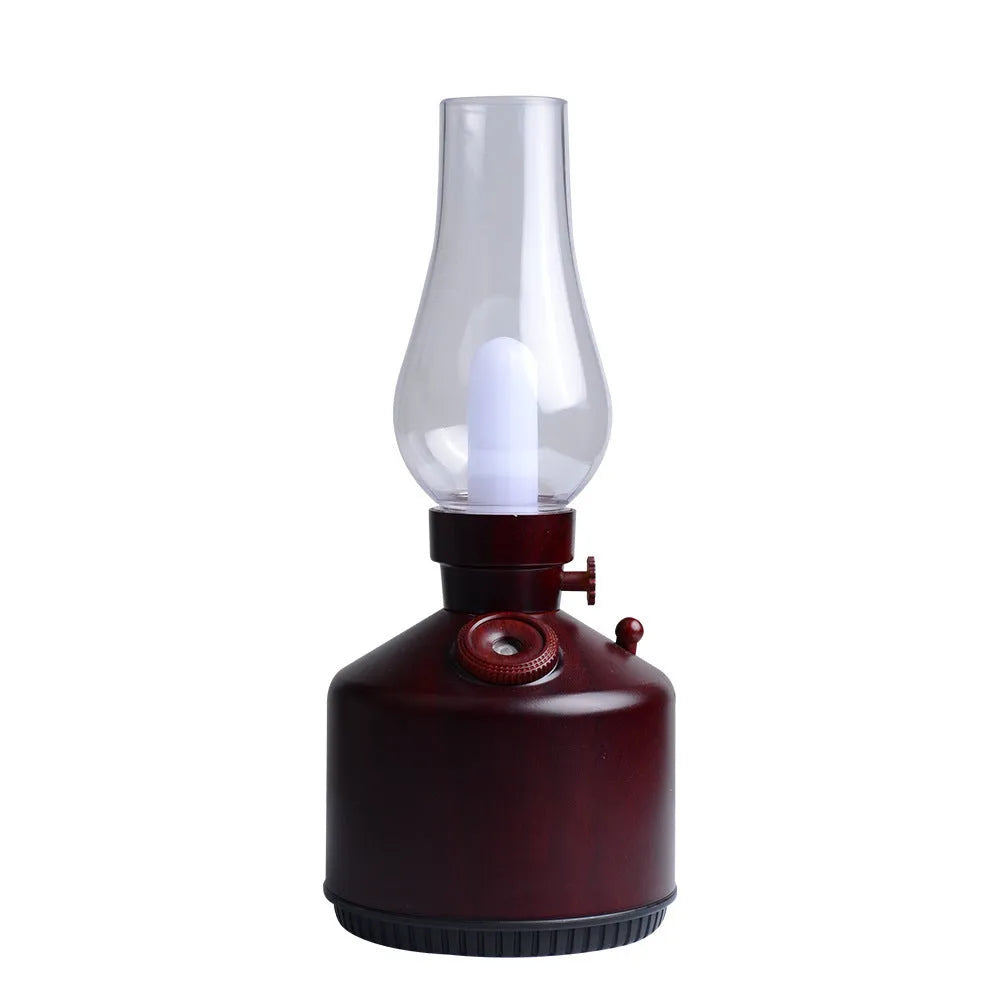 Kerosene lamp ultrasonic humidifier in brass colour with single fog outlet on wooden desk