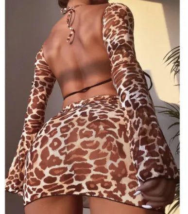 Leopard print three-piece bikini swimsuit with top, skirt, and panties
