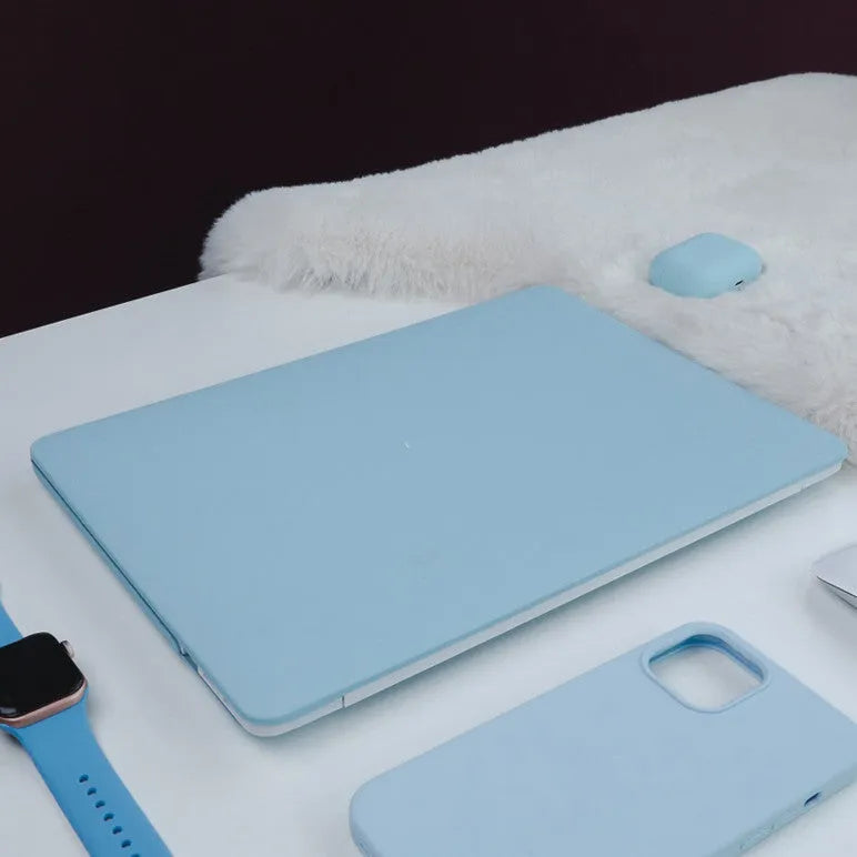 Dream Blue 16 inch laptop sleeve with colourful sticker-style print, open showing inner lining