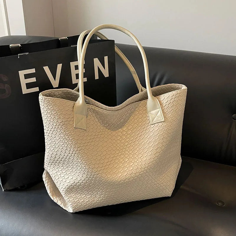 Woven PU shoulder bag for women with double straps, available in beige, black, gray, and khaki