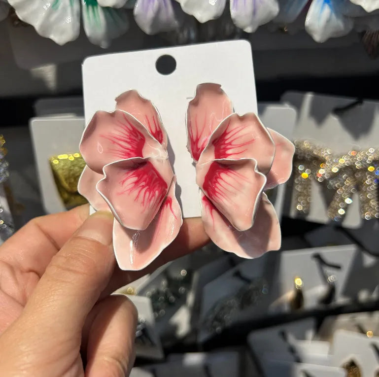 Pastoral style alloy flower stud earrings with oil-spot glaze finish in floral designs