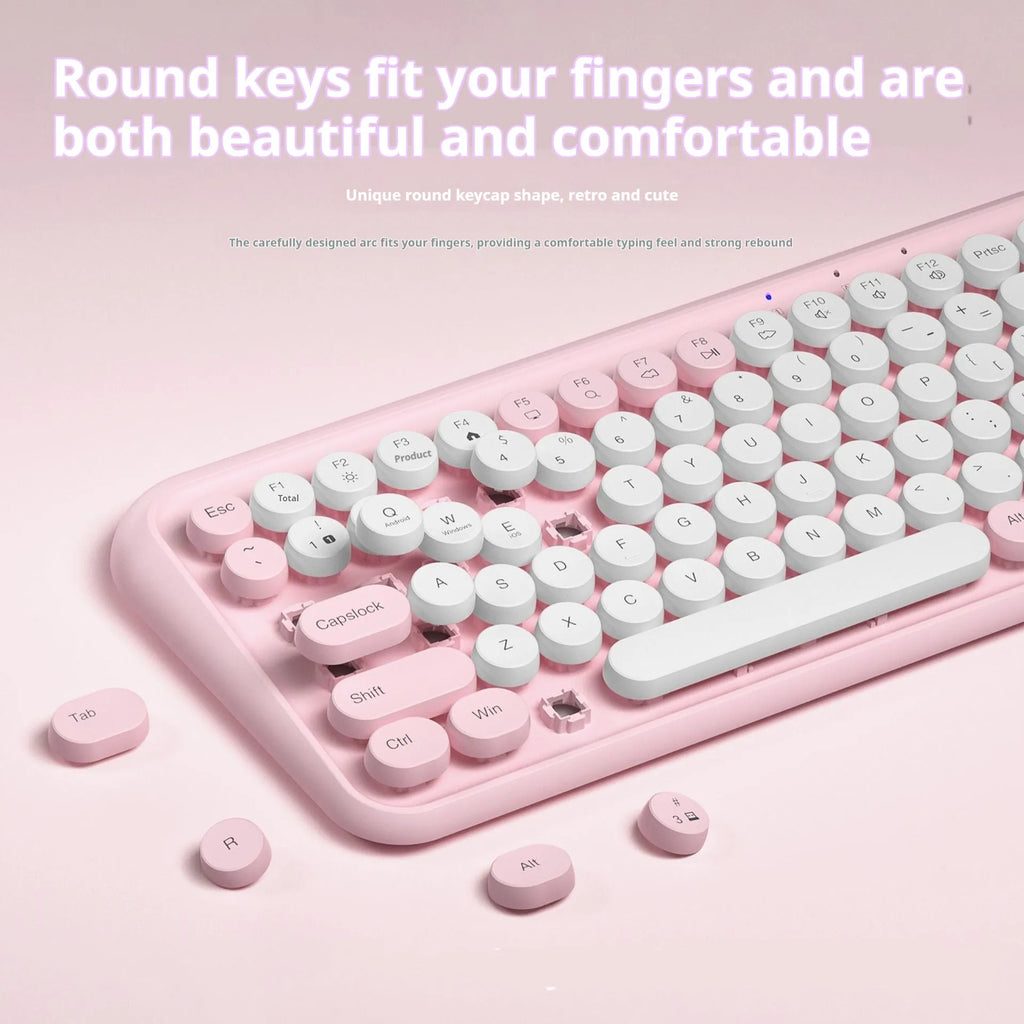 Pink wireless Bluetooth keyboard with 84 keys and compact rectangular design