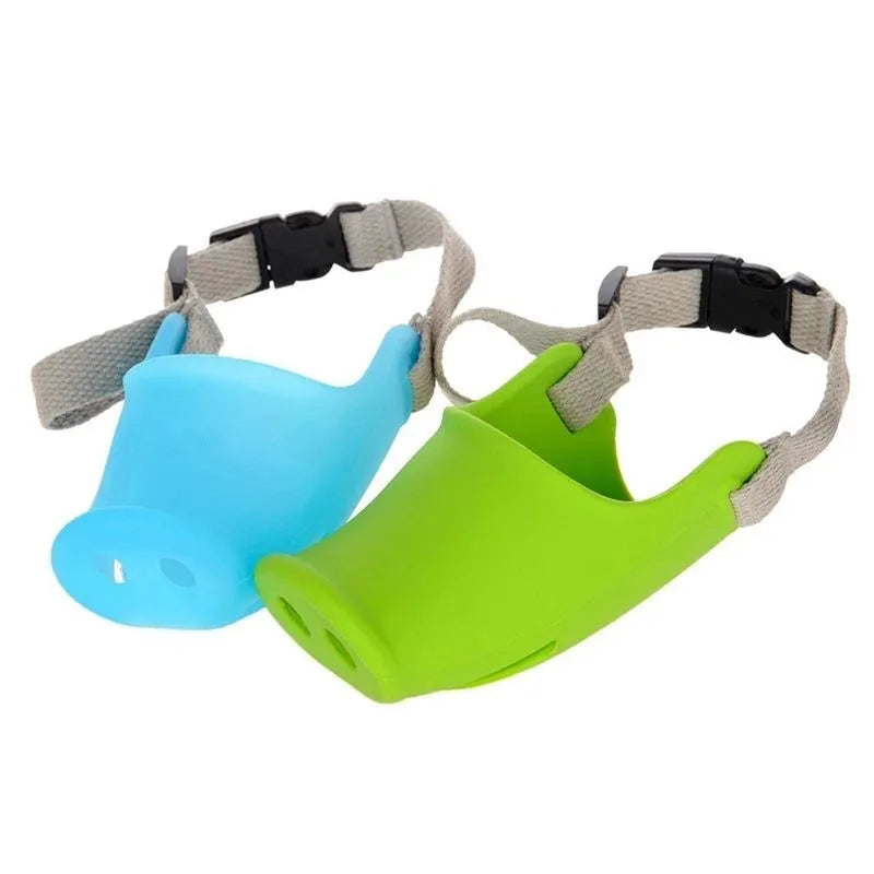 Blue silicone anti-bite mouth cover for dogs showing sizing on long-nosed pet