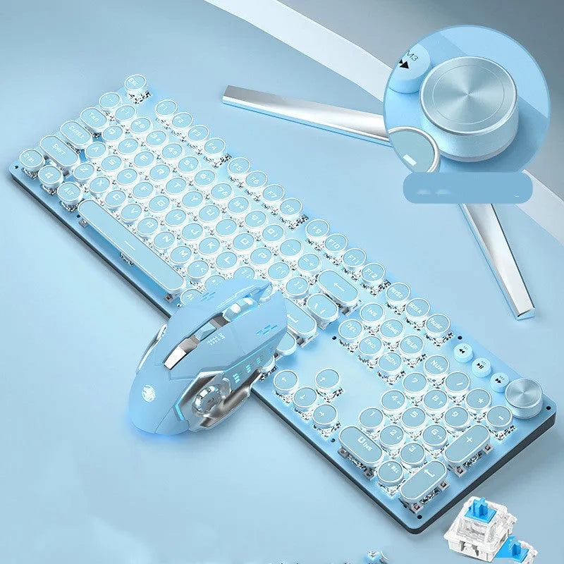 Sky blue retro punk mechanical keyboard with white backlight and green switches alongside wired mouse on a wooden desk