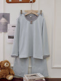 Round neck de velvet women's pajama suit with long-sleeved top and striped trousers in light blue