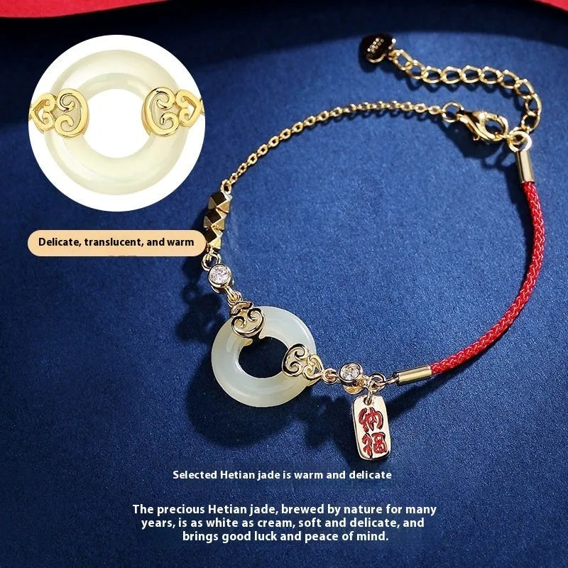 Women's sterling silver jewellery set with gourd bracelet, Fu necklace, and earrings featuring inlaid Hetian jade.