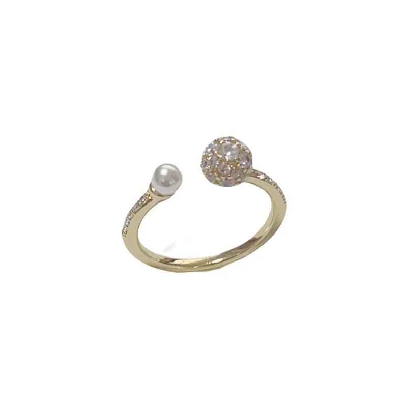 Round zircon open-end pearl ring in gold or silver colour with thick real gold plating over copper