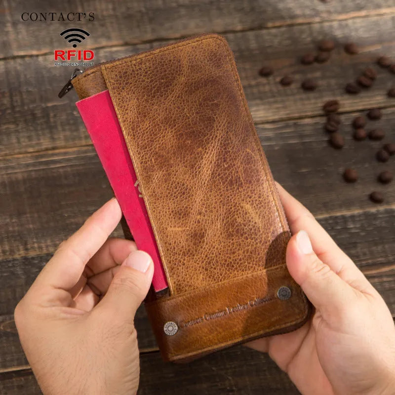 Brown genuine cowhide leather men's long wallet with zipper closure showing anti-theft card compartments