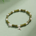 Green aventurine bamboo pattern bracelet with electroplated components and adjustable closure