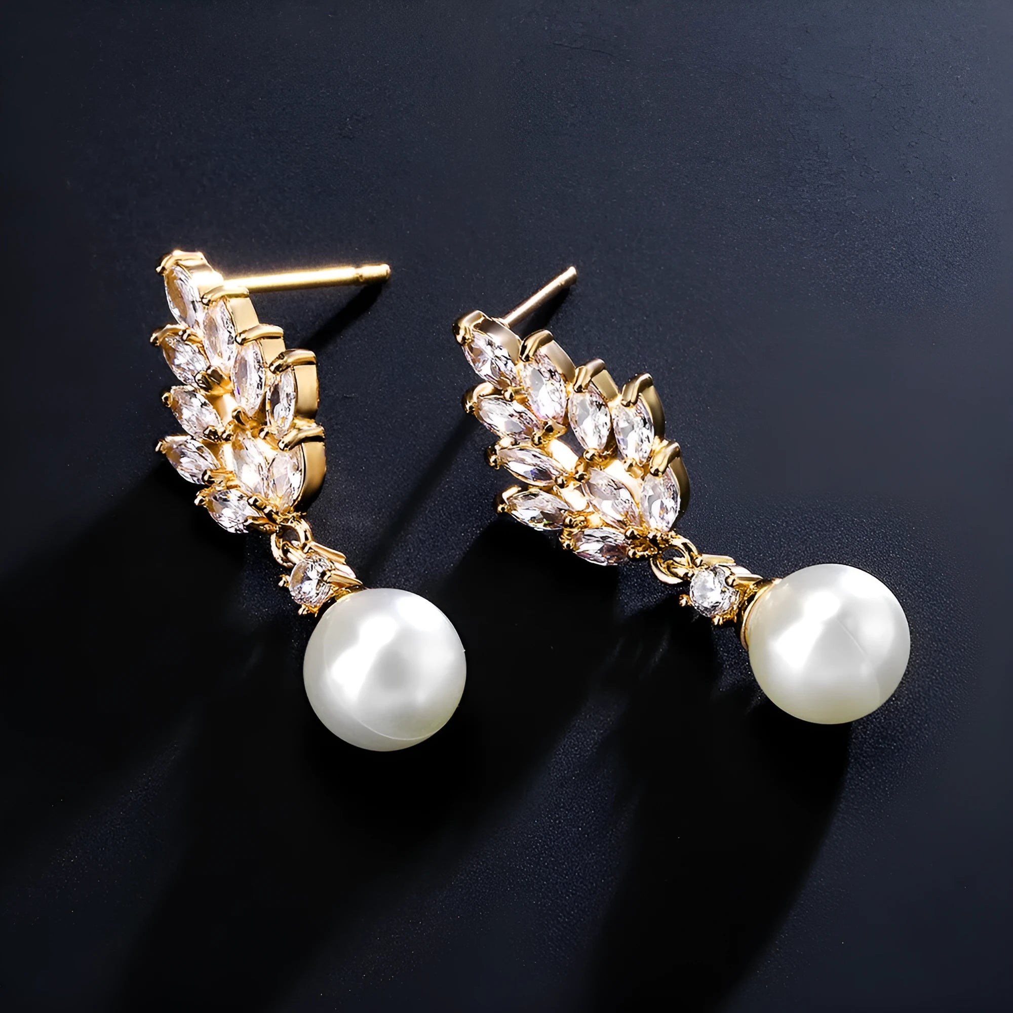 Gold, platinum, and rose gold plated geometric flower earrings with micro-inlaid zircon and pearl details.