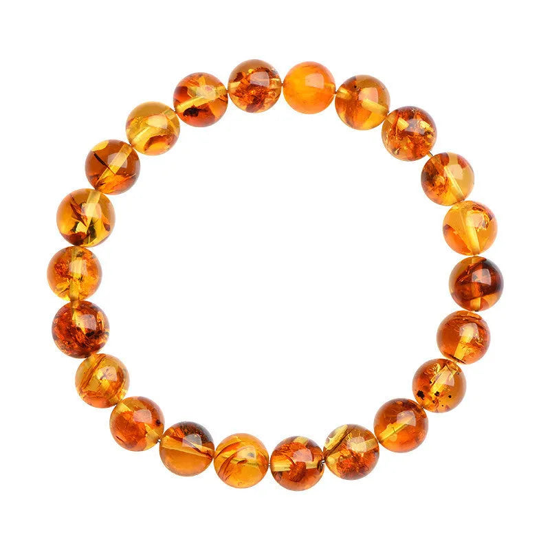 Natural yellow piebald amber bracelet with geometry beads showing flower spot patterns