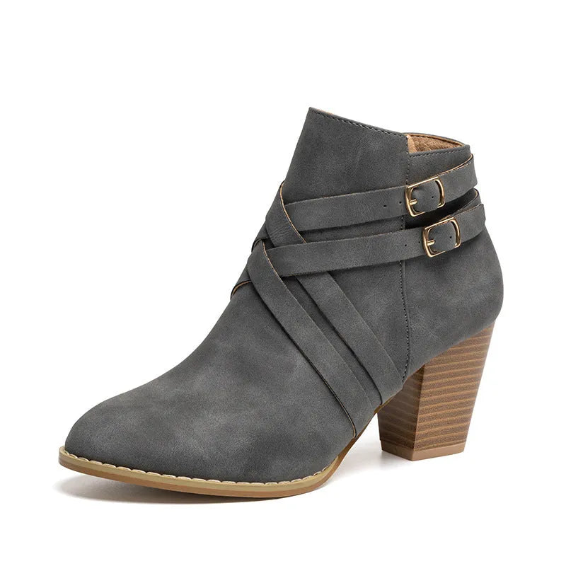 Plus size short ankle boots with a 7cm heel and side zip, shown in grey, black and brown.