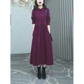 Purplish red plus size women's long sleeve dress with a long skirt for autumn winter wear.