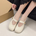 Women's buckle casual leather flat pumps in solid colour with belt buckle, round toe, low top.