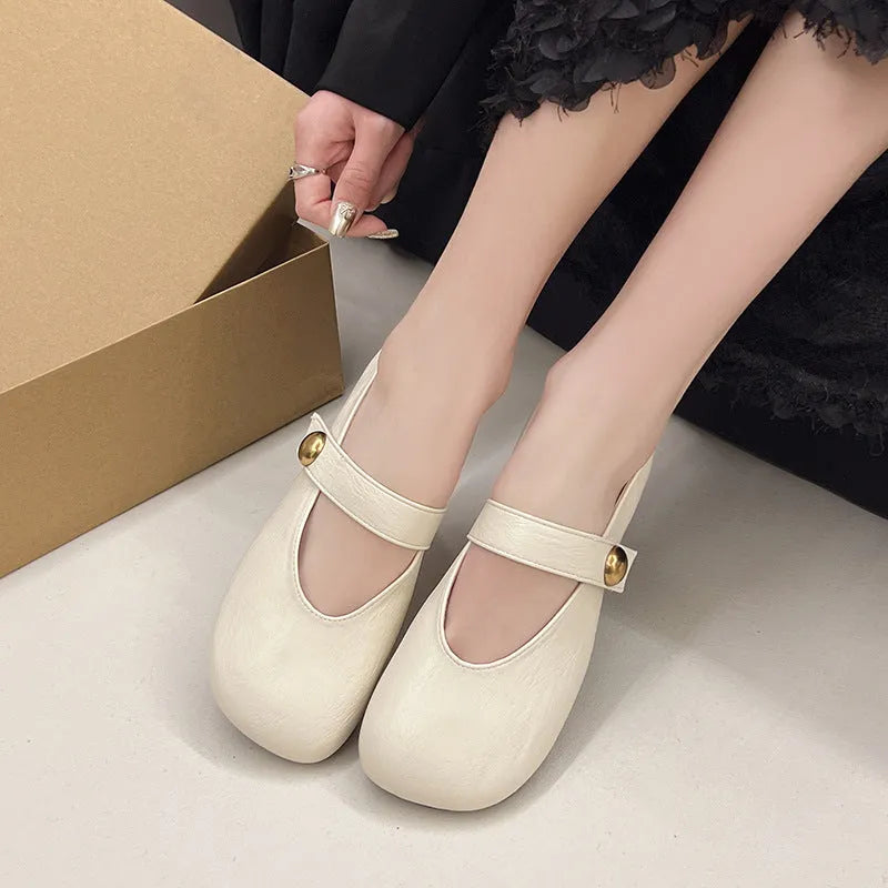 Women's buckle casual leather flat pumps in solid colour with belt buckle, round toe, low top.