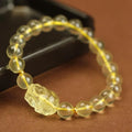 Yellow leather Chinese Pi Xiu bracelet with artificial crystal beads