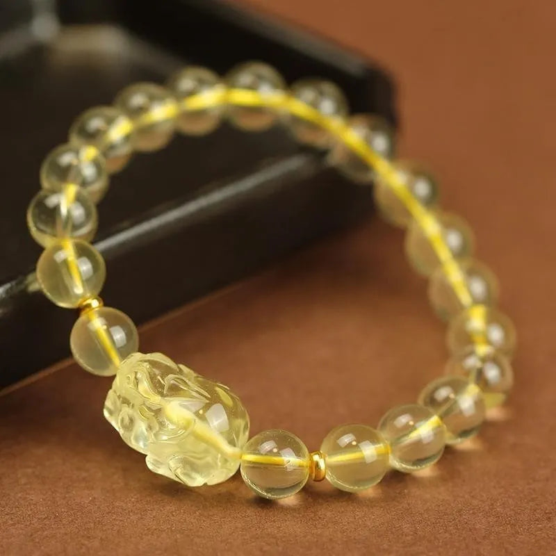 Yellow leather Chinese Pi Xiu bracelet with artificial crystal beads